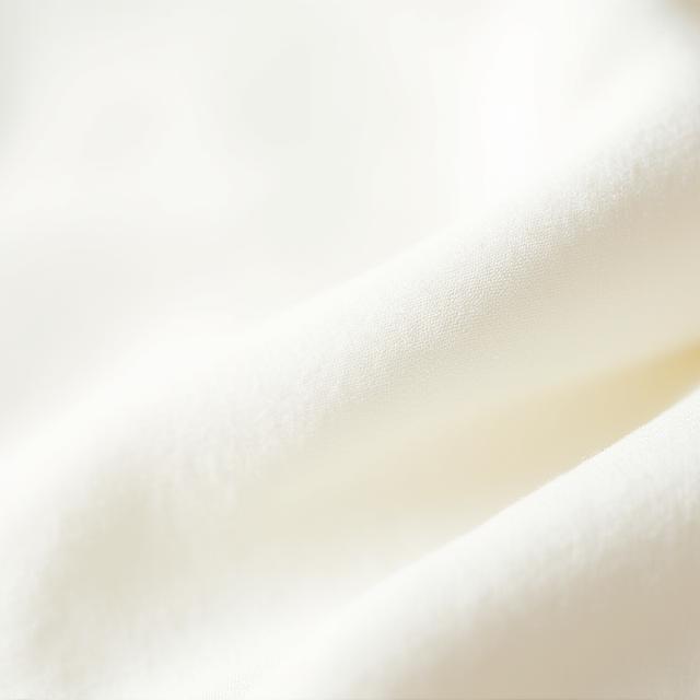Detailaufnahme einer Leinentischdecke mit feiner Textur